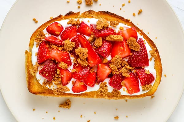 Fresh strawberry toast on a plate.