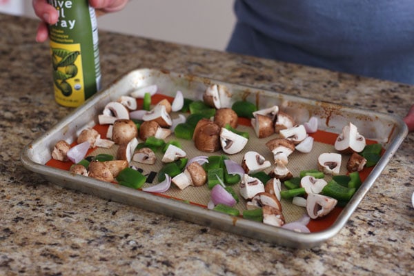 Chopped vegetables on a quarter sheet pan 