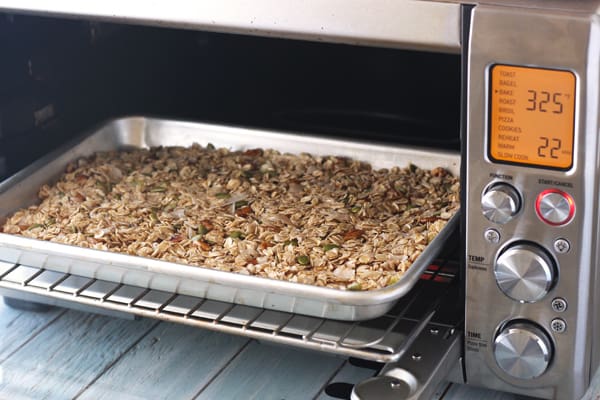 Granola baking in a toaster oven.