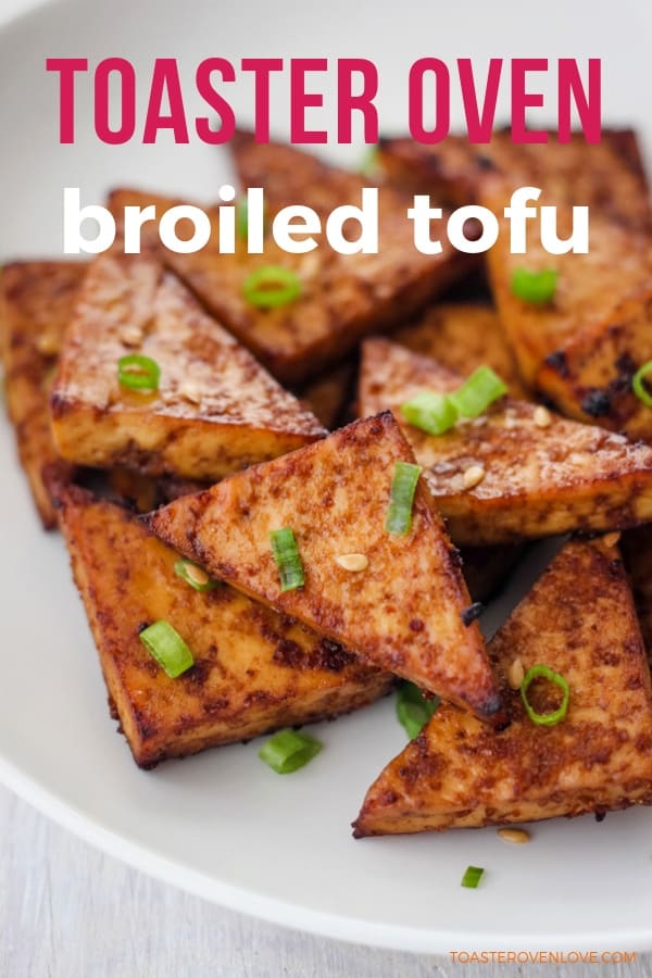 Broiled toaster oven tofu on a white plate.