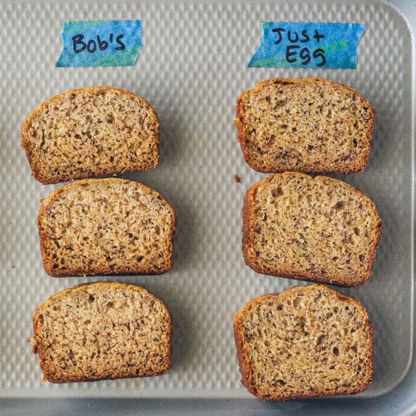 Overhead view of mini banana bread slices labeled "Bob's" and "Just Egg".